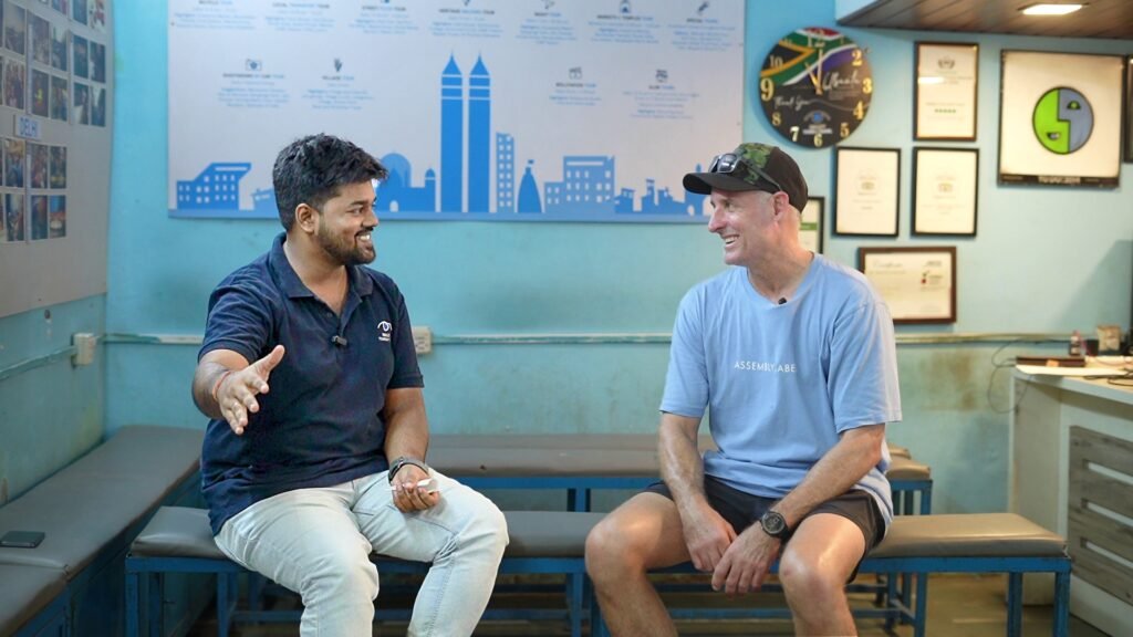 Michael hussey visits dharavi with reality tours and travel