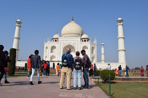 tourists exploring taj mahal with krishna from reality tours and travels