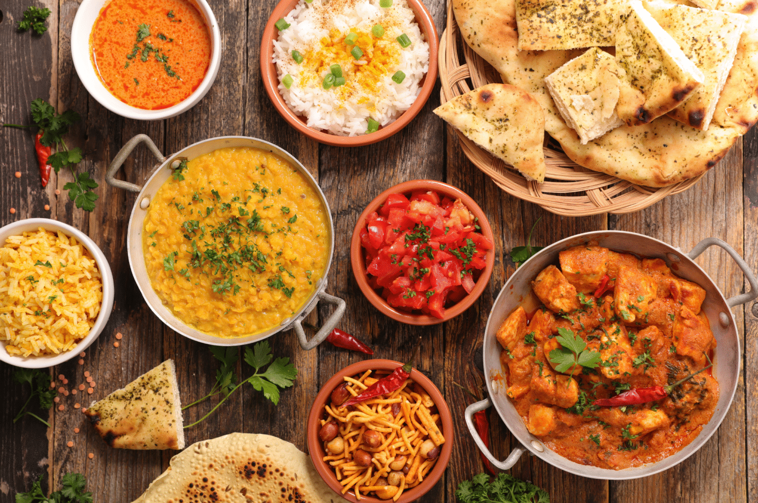 Indian Cuisine pictures which include paneer, naan, rice, daal and rice.