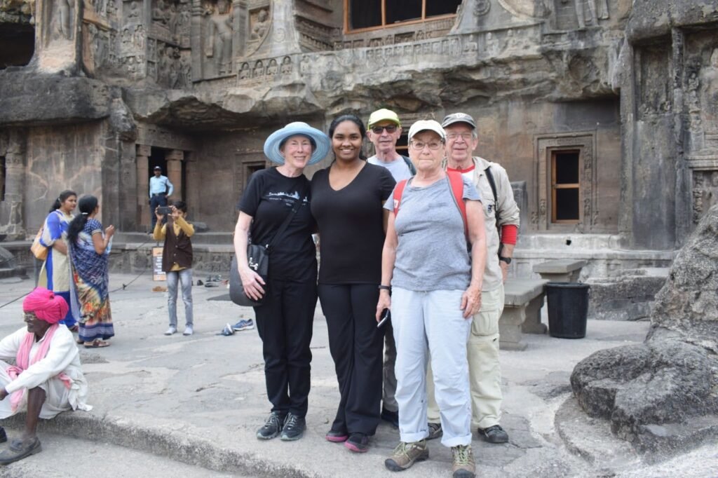 Visitors exploring Ellora Caves complex near Aurangabad